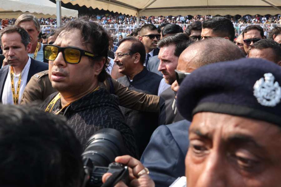 Argentine soccer star Lionel Messi and organiser Satadru Dutta at the stadium during his tour of India
