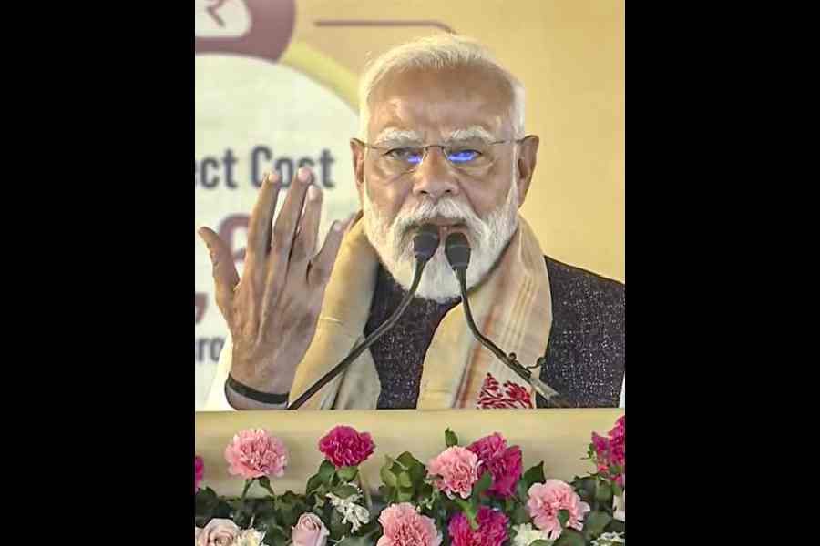 Narendra Modi addresses the gathering at Namrup in Assam on Sunday.