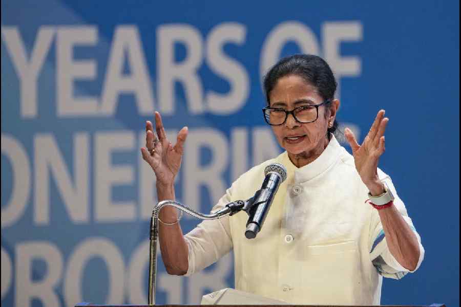 West Bengal Chief Minister Mamata Banerjee speaks during Business and Industry Conclave 2025, in Kolkata, Thursday, Dec. 18, 2025.