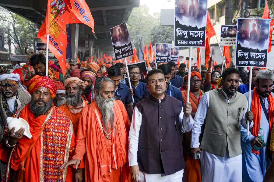 Leader of the Opposition in the Bengal Assembly and BJP leader Suvendu Adhikari, along with members of Hindu outfits, protests the killing of a Bengali Hindu youth in Bangladesh near the Bangladesh Deputy High Commission in Calcutta on Monday.