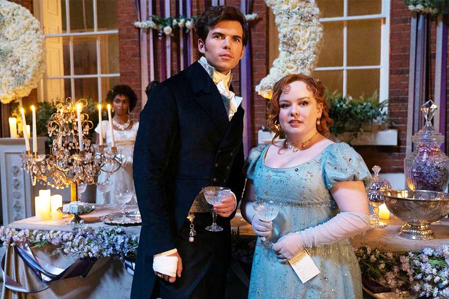 Luke Newton and Nicola Coughlan as Colin and Penelope Bridgerton