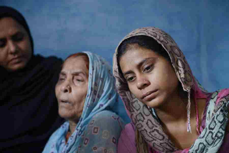 Mohammad Akhlaque’s mother Asgari Begum and his daughter Shaista attheir home in Uttar Pradesh in 2015
