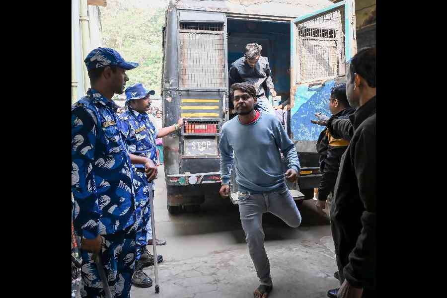 Convict Brajagopal, expelled Trinamool leader Samarendra Gayali, being taken to court in Ranaghat before the verdict was announced on Tuesday.