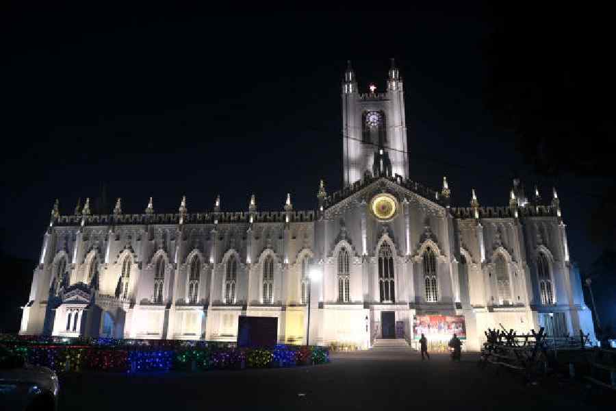 St Paul’s Cathedral is illuminated on Tuesday evening, December 23, 2025, ahead of Christmas celebrations in Kolkata. — Picture by Sanat Kr Sinha.
