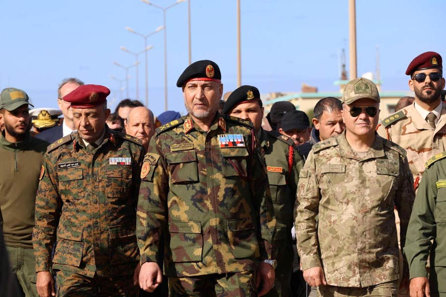 Libya's army chief of staff Mohammed Ali Ahmed Al-Haddad (centre) attends a ceremony at a medical training camp on a military base in Al-Khums, Libya, December 21, 2025.