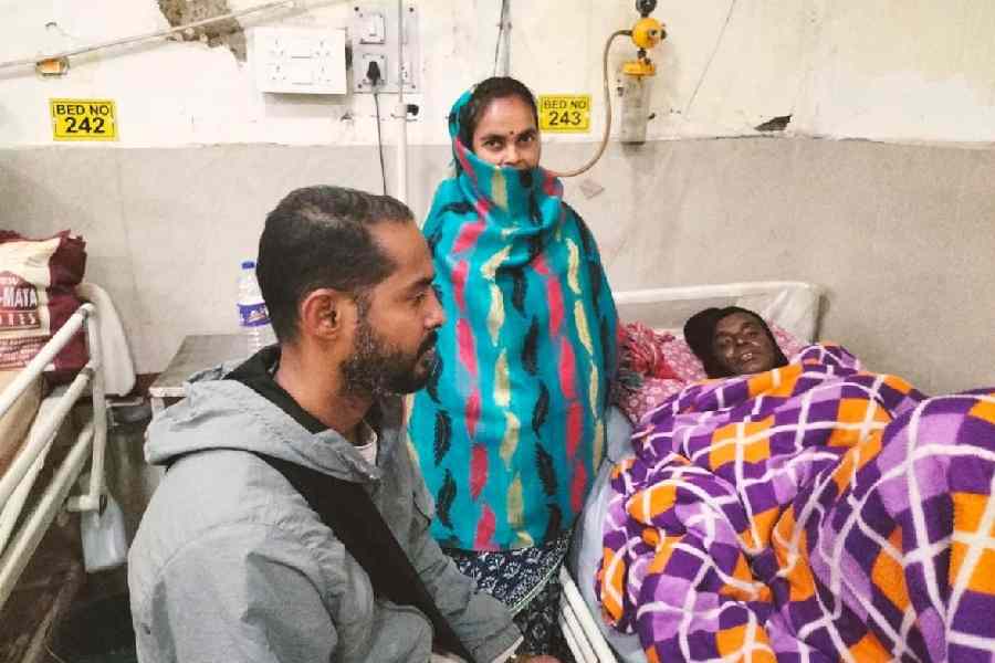 Shyamapada Shil with his family at the hospital on Wednesday afternoon
