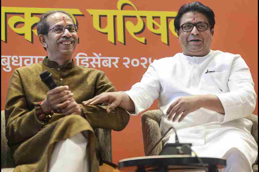 Uddhav Thackeray (left) and Raj Thackeray at the joint news conference in Mumbai on Wednesday.