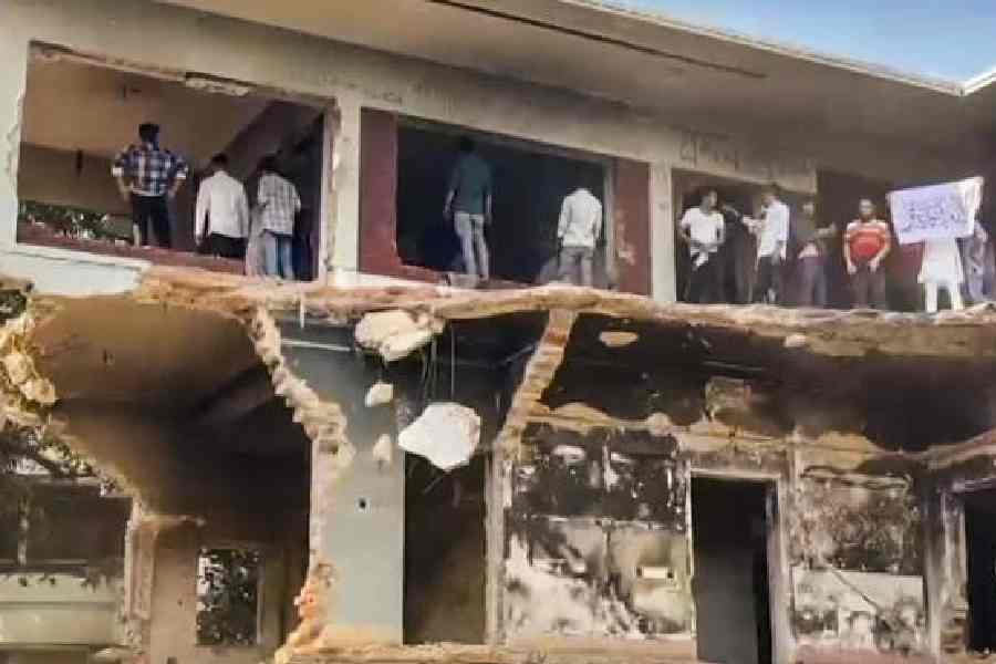 Protesters inside former Prime Minister Sheikh Mujibur Rahman's vandalised home in Dhaka last week.