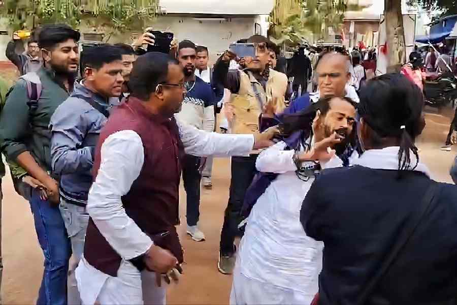 A Matua devotee beaten up by members of the rival faction on Thakurbari premises in Thakurnagar under the Bongaon subdivision of North 24-Parganas on Wednesday afternoon. 