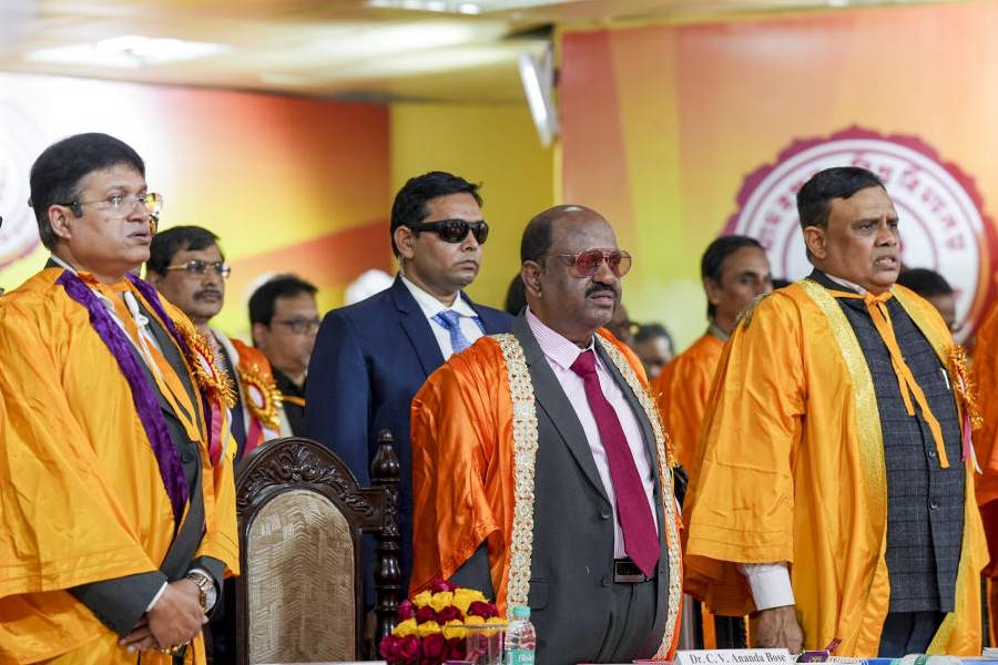 From left, Jadavpur University Vice-Chancellor Chiranjib Bhattacharjee, West Bengal Governor and Chancellor CV Ananda Bose and former chairman of All India Council of Technical Education TG Sitharam during the university's convocation, in Kolkata, Wednesday, Dec. 24, 2025.