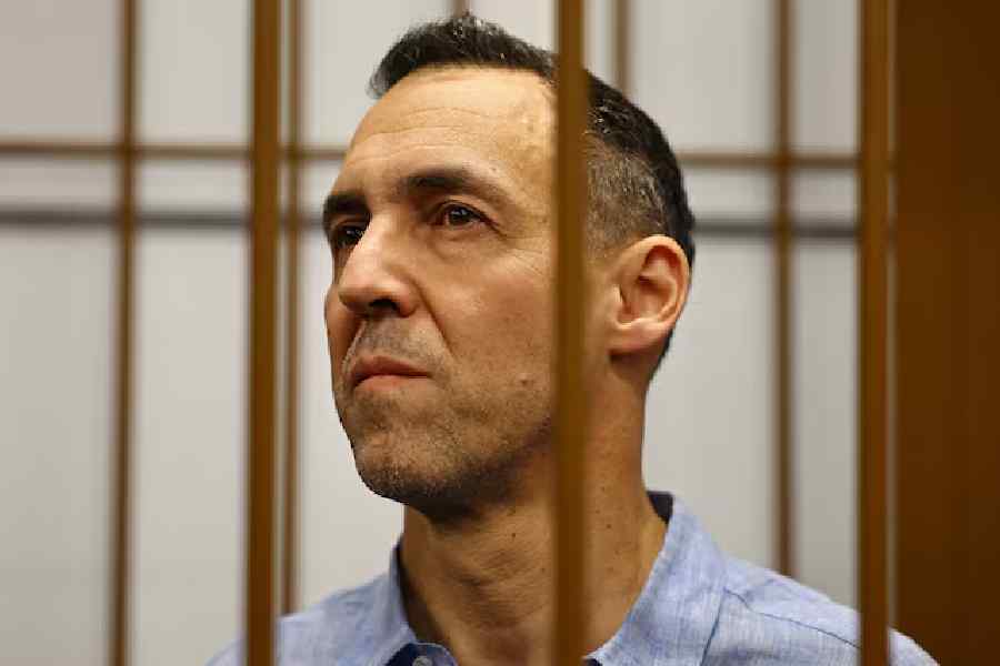 French researcher Laurent Vinatier, who is suspected of illegally collecting sensitive Russian military information, stands inside an enclosure for defendants during a court hearing in Moscow, Russia October 14, 2024.