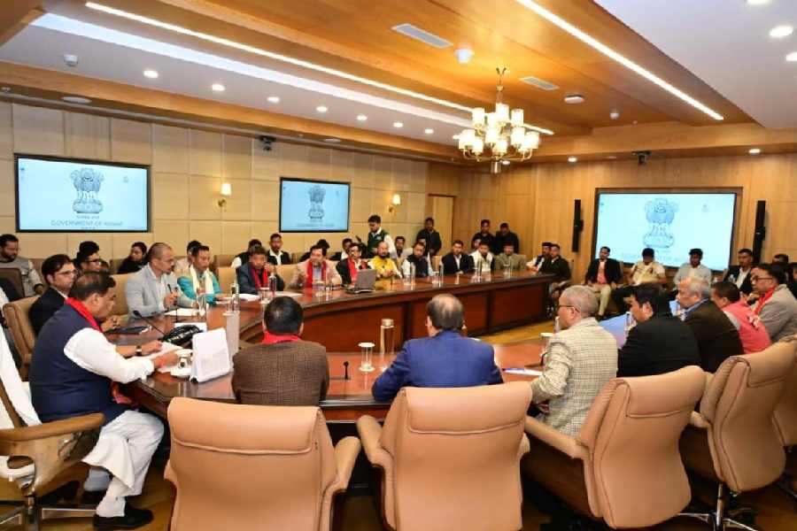 Himanta Biswa Sarma (extreme left) at the tripartite meeting on Friday