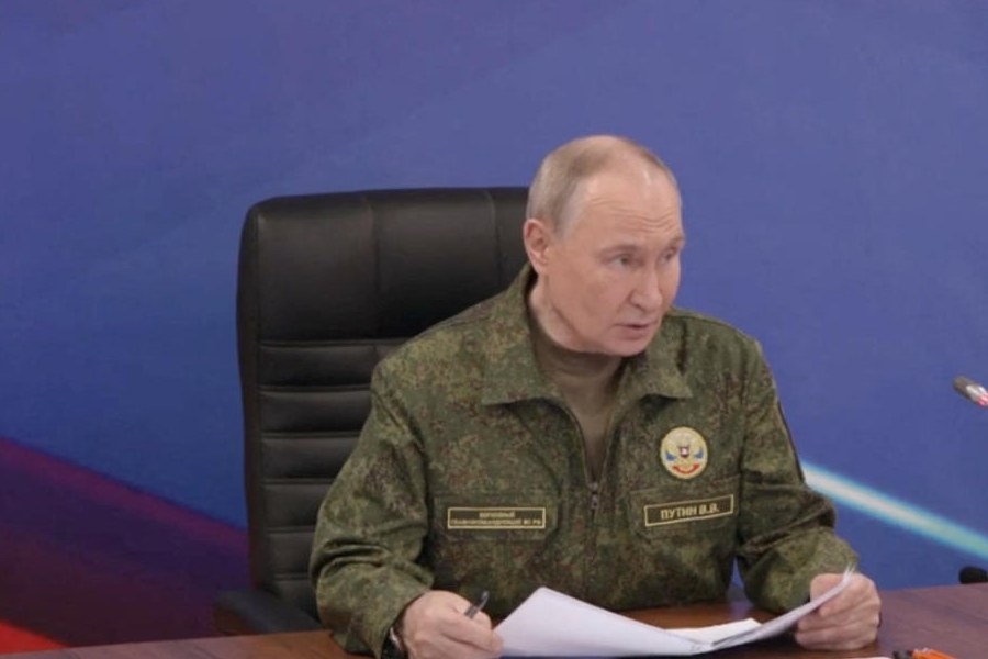 Russian President Vladimir Putin speaks, as he visits the command post of the Russian forces grouping in the course of Russia-Ukraine conflict, in unidentified location, in this still image taken from video released December 27, 2025.