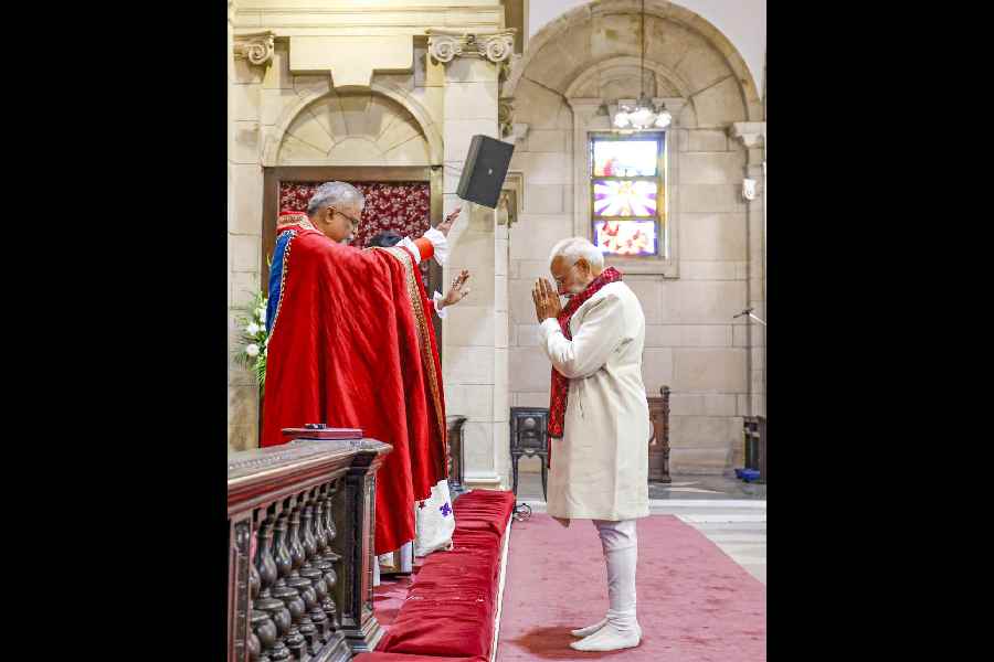Prime Minister Narendra Modi during the Christmas morning service at the Cathedral Church of the Redemption, in New Delhi.