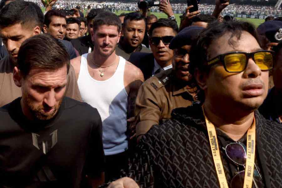 Satadru Dutta with Lionel Messi at the Salt Lake Stadium on December 13 