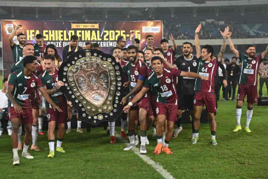 Mohun Bagan Super Giant players celebrate with the IFA Shield in Calcutta on October 18, 2025. Barring Bagan, Emami East Bengal and a few others, most of the ISLclubs have not played much football in the 2025-26 season.