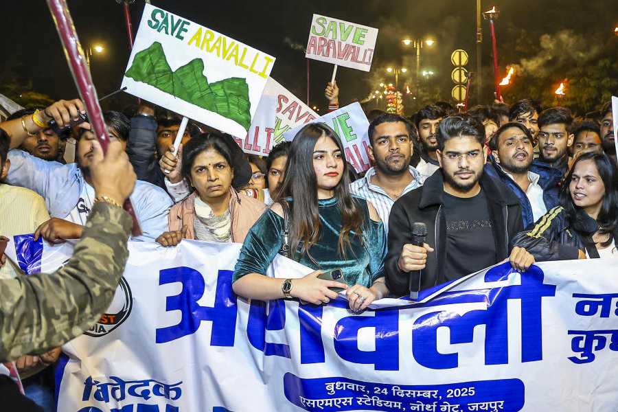People take part in a 'Save Aravalli' protest led by Gen-Z, marching from SMS Stadium to Amar Jawan Jyoti, in Jaipur, Wednesday, Dec. 24, 2025.