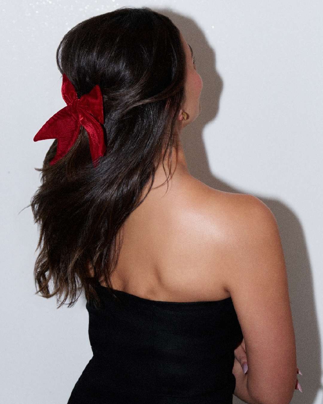 Alia Bhatt in a red bow. 