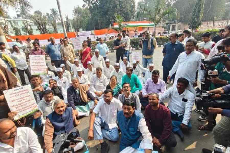 Odisha Congress leaders protest outside the TPCODL office in Bhubaneswar on Monday