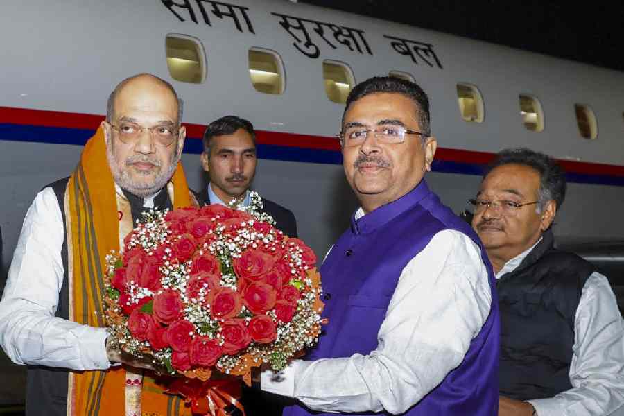 Amit Shah being welcomed by Suvendu Adhikari upon the former’s arrival at the Calcutta airport on Monday.