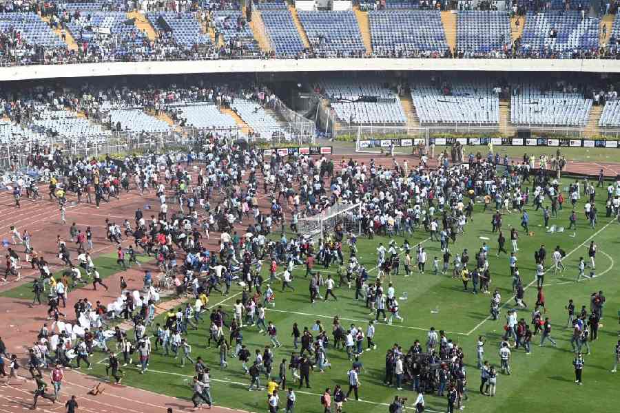 Spectators run amok after the Lionel Messi programme turned chaotic at Salt Lake Stadium in Calcuttaon December 13.
