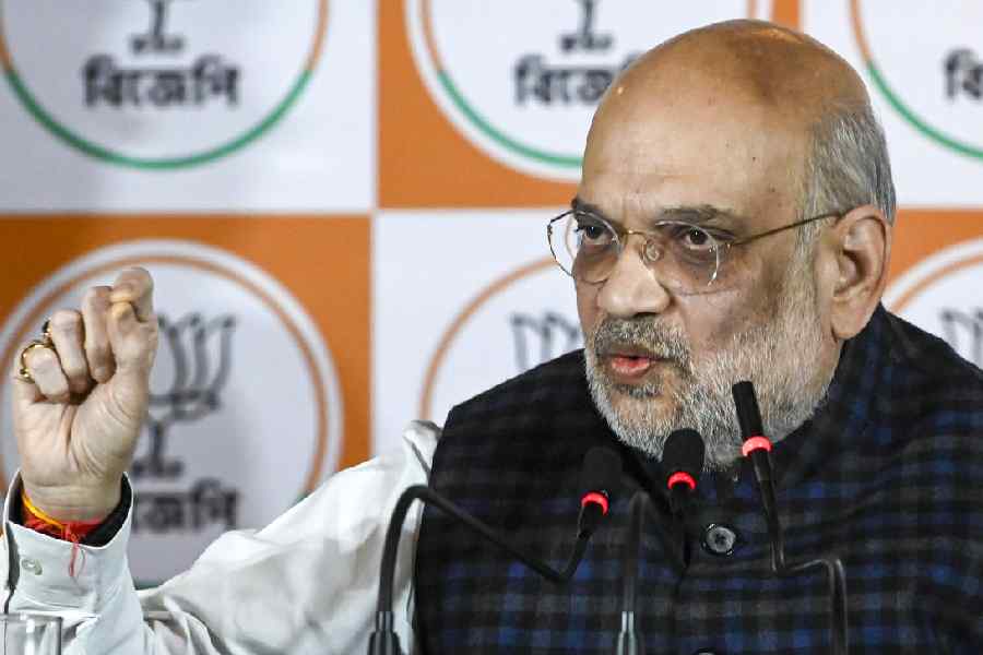 Union Home Minister Amit Shah addresses a press conference, in Kolkata, Tuesday, December 30, 2025.