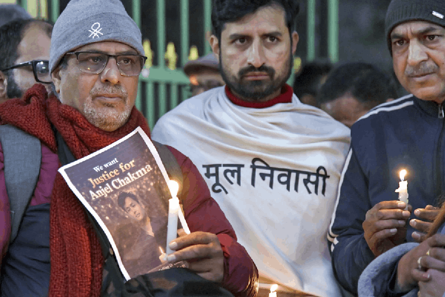 Members of students' organisations and locals participate in a candlelight march at Gandhi Park protesting the assault and death of Tripura student Angel Chakma, in Dehradun, Monday, Dec. 29, 2025.