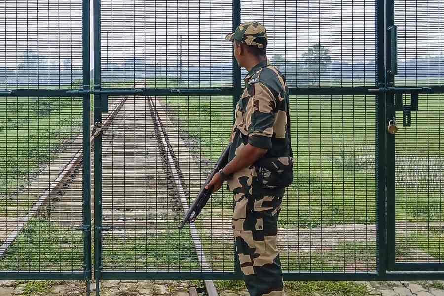 A security guard near the Bangladesh border in Malda district