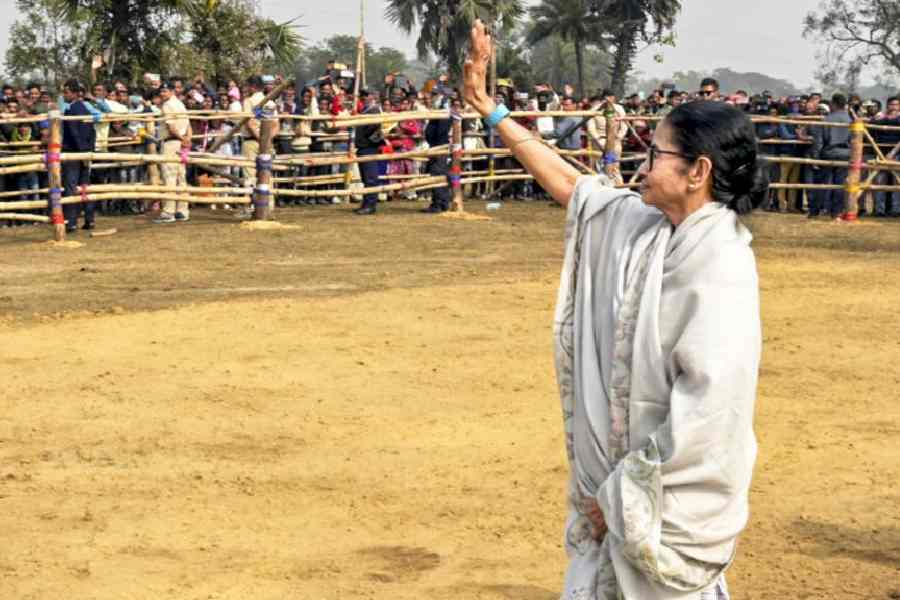 Chief minister Mamata Banerjee greets supporters during a public meeting in Barjora, Bankura.