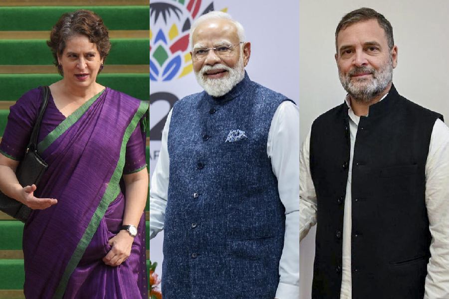 Priyanka Gandhi, Narendra Modi, Rahul Gandhi (L-R)