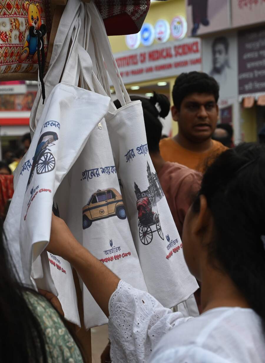 Pick up a tote with some catchy slogan to take home your Boi Mela haul