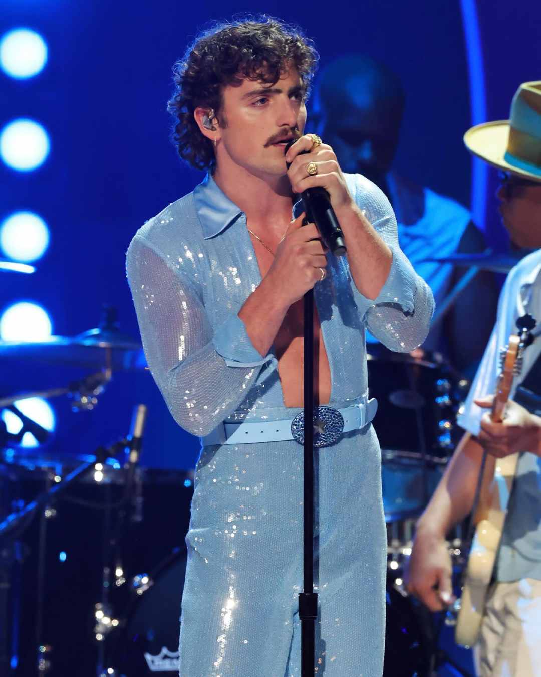 Beautiful Things singer Benson Boone looked dapper in a sheer blue jumpsuit. 