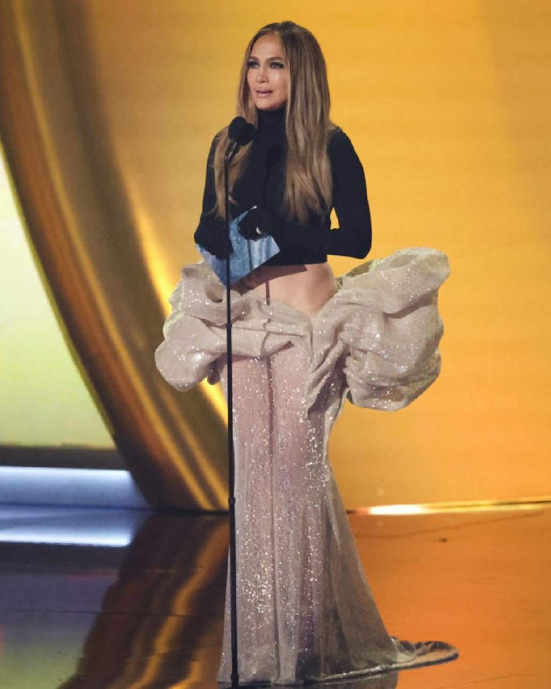Jennifer Lopez presented the award to Shakira. The 55-year-old actress-singer wore a black full-sleeved top over a striking beige skirt.  