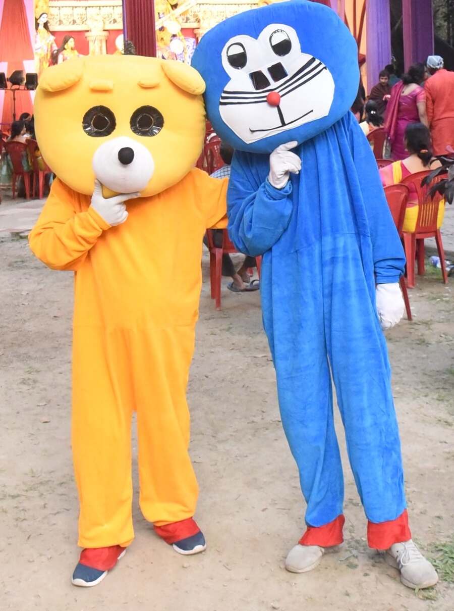 Doreamon and his friend keep children entertained at Lake Kalibari's Saraswati Puja