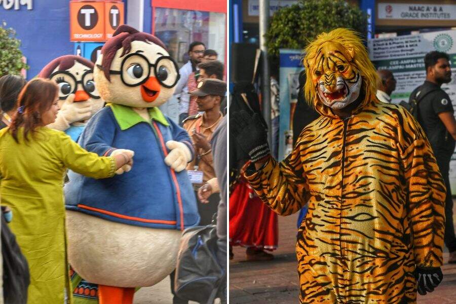 A bustling Kolkata Boi Mela on a weekday saw the fair’s official mascots Haso and Hasi with its fans, young and old