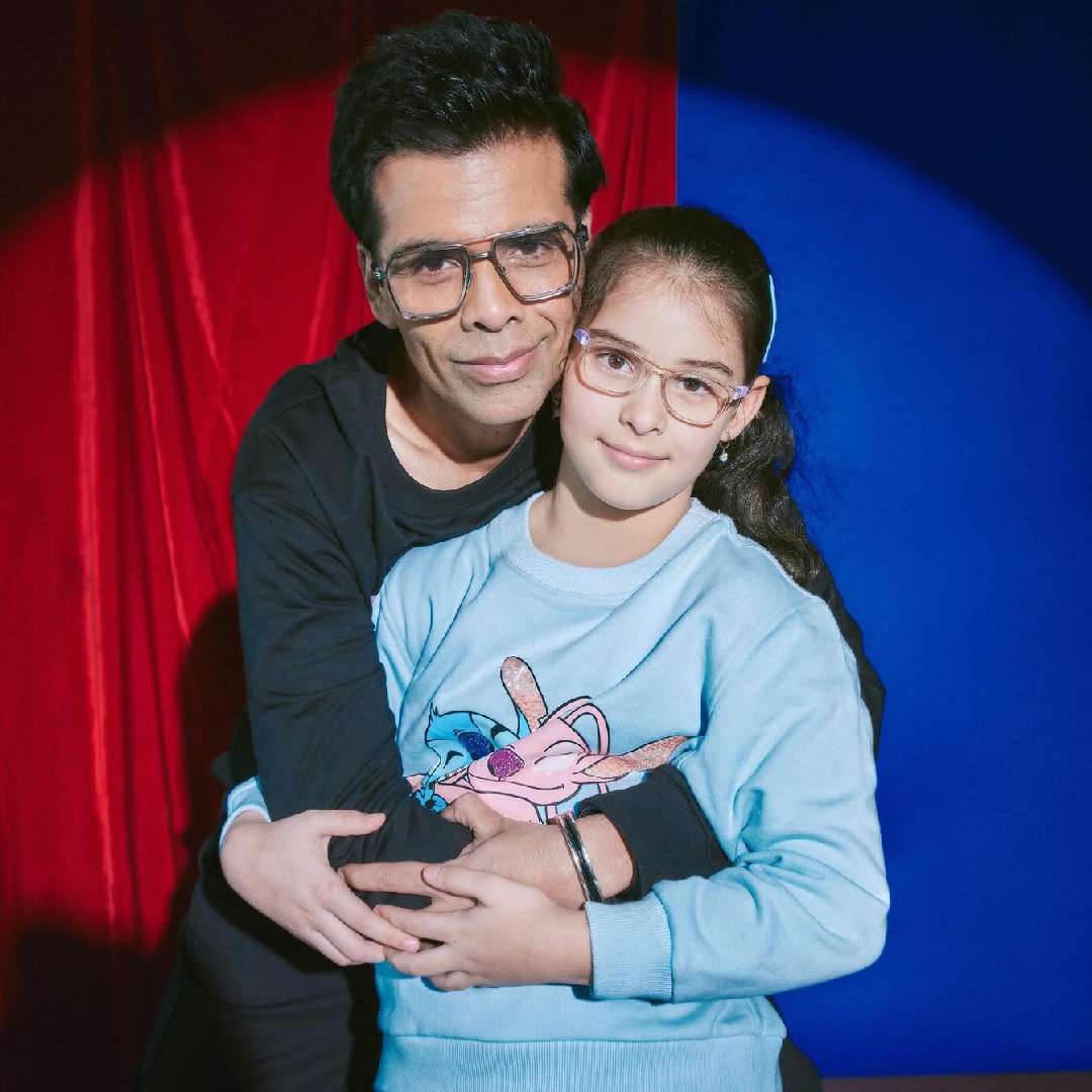 Karan Johar on Friday shared never-before-seen photos with his twin kids, Roohi and Yash, to mark their eighth birthday.