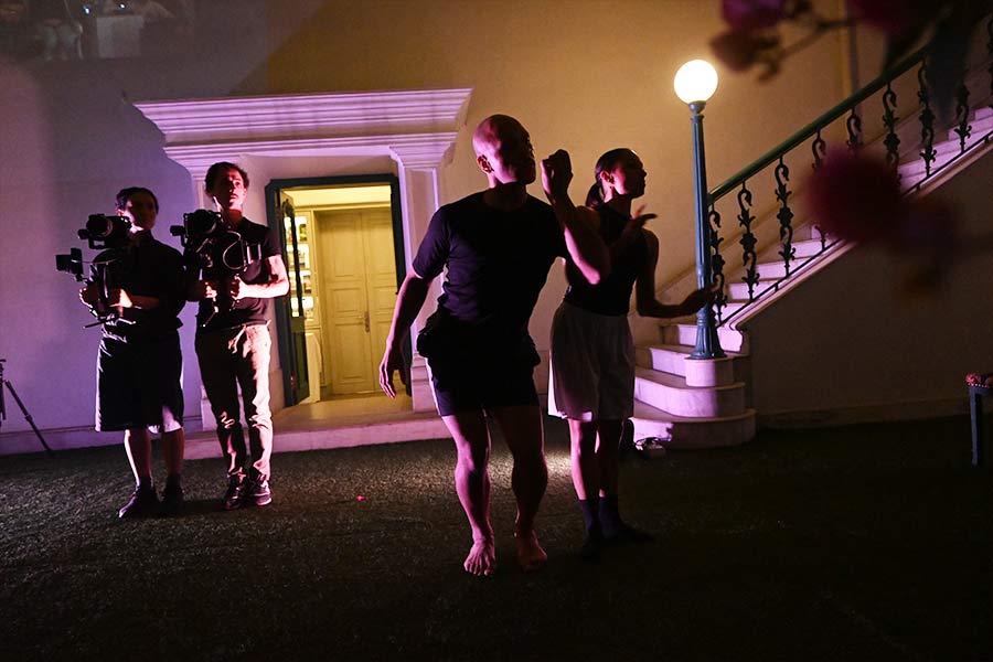 ‘Shoot the Cameraman’ is an innovative narrative that merges contemporary dance with live videography. The performance integrates two camerapersons — who are also performers — into the choreography. While in motion, they capture the other two dancers live using a camera gimbal, with the footage projected onto the backdrop in real time. The result is an immersive experience where the audience can shift their focus between the live performance and its cinematic representation on screen