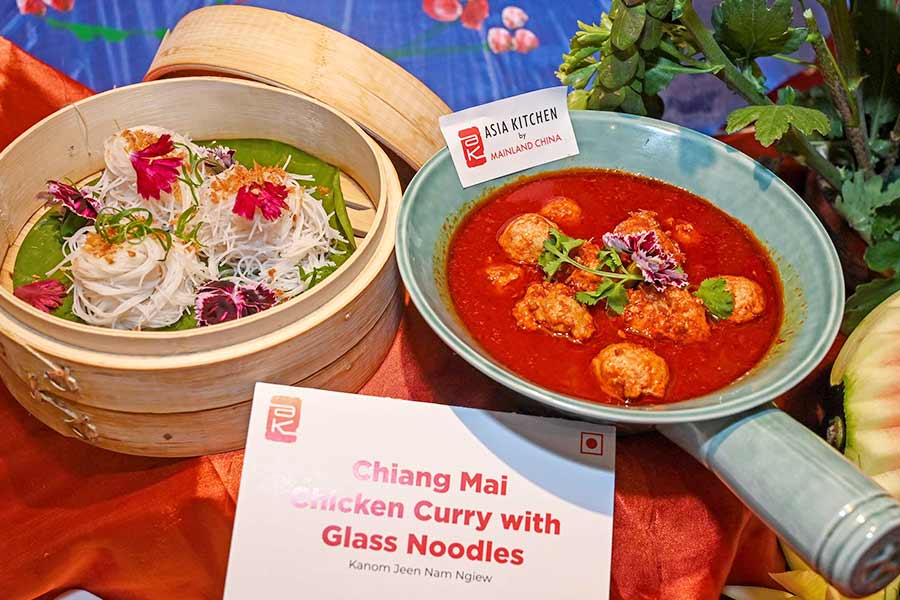 The next dish was a classic pairing from the heart of Chiang Mai — thin, soft glass noodles served with a spicy and flavourful Chiang Mai-style chicken curry