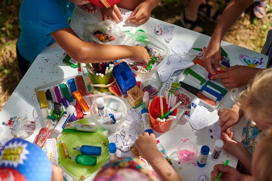 Children making crafts at a party