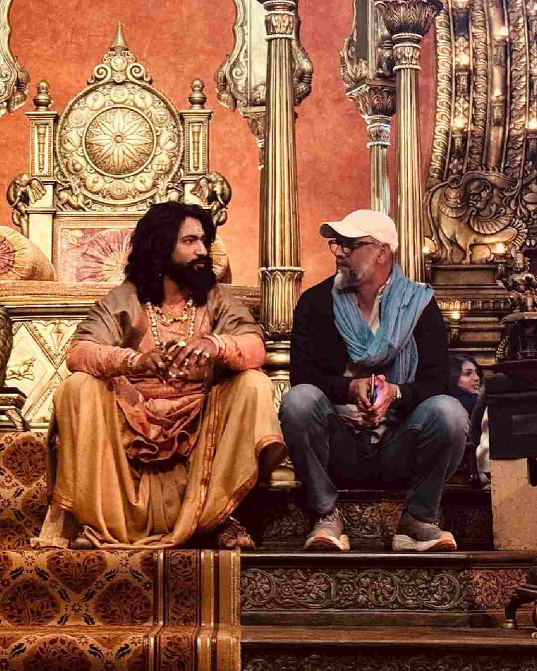 Vicky Kaushal and Laxman Utekar appear engrossed in a conversation on the set of Chhaava.  