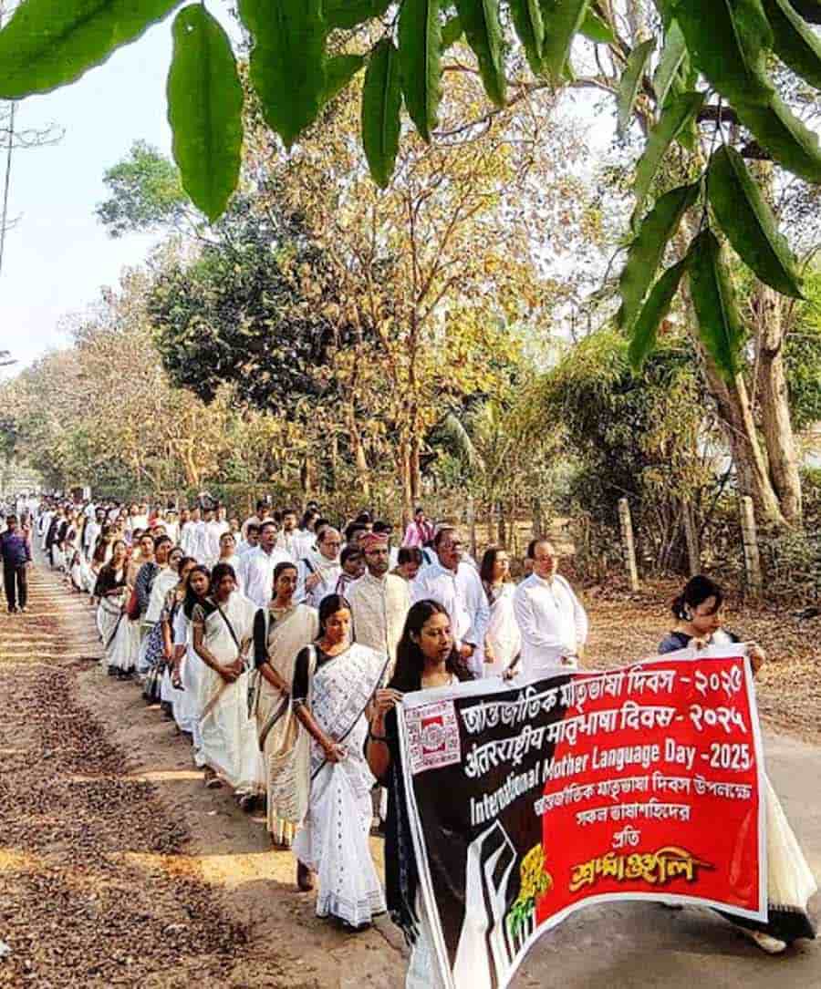 Students take out a march during International Mother Language Day celebrations in Visva-Bharati University in Santiniketan
