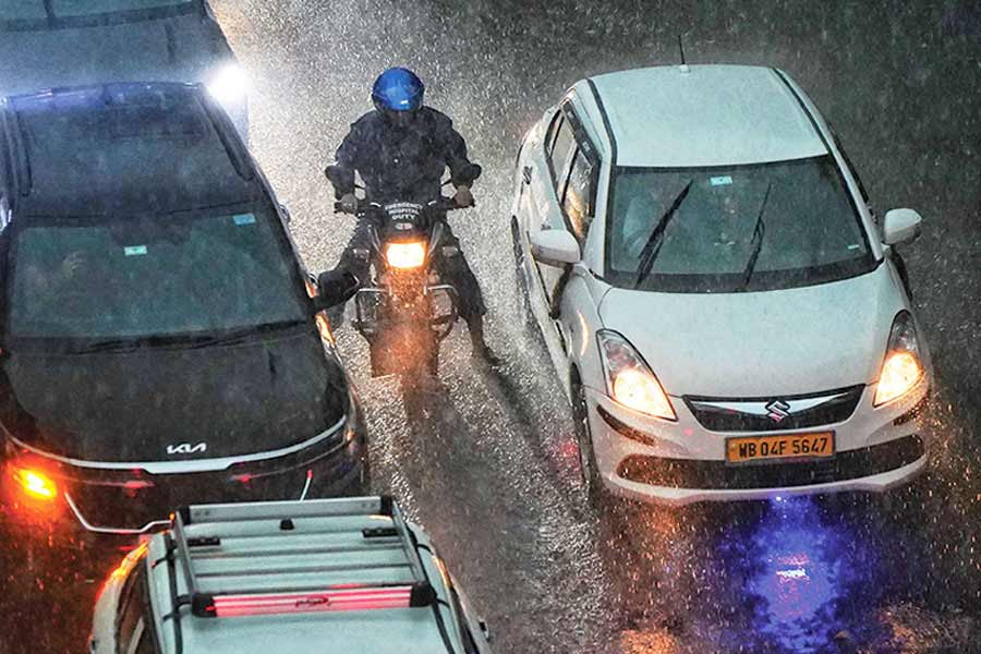 Early spring rain caught Kolkatans unawares on February 20 slowing down traffic and leading to congestion on roads, inconveniencing examinees and office commuters  