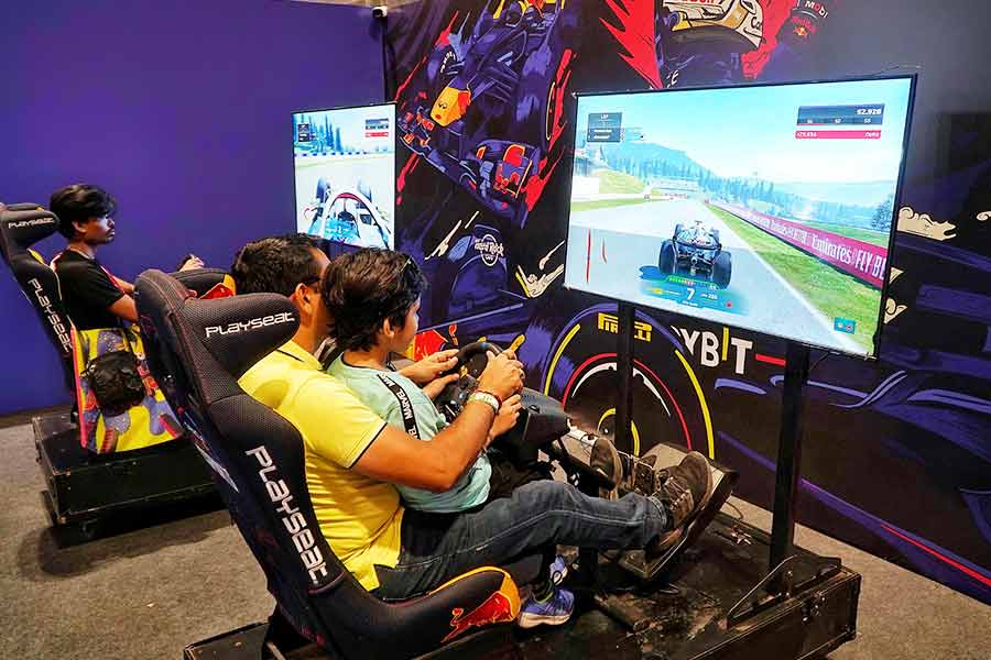 Another adrenaline-pumping experience was the racing car simulator, where attendees sat behind the wheel for a hyper-realistic driving game