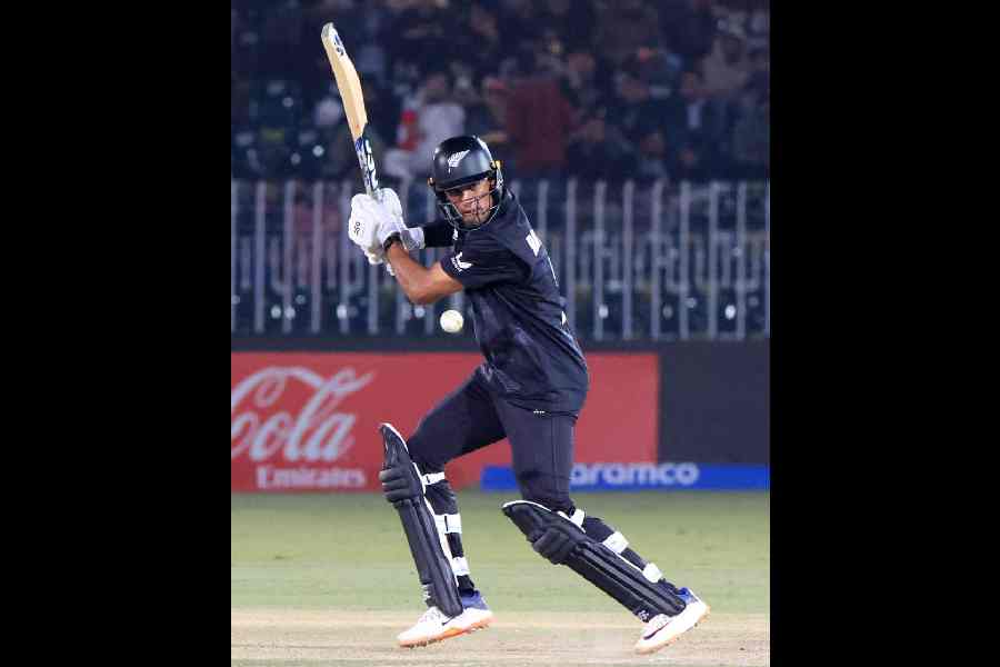 Cricket - ICC Men's Champions Trophy - Group A - New Zealand v Bangladesh - Rawalpindi Cricket Stadium, Rawalpindi, Pakistan - February 24, 2025 New Zealand's Rachin Ravindra in action.