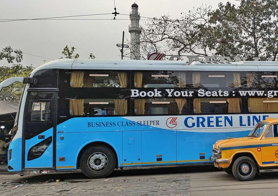 A business-class sleeper bus parked at the Esplanade terminus. These Volvo buses are in demand among tourists travelling to Purba Medinipur, north Bengal, Durgapur and Asansol. Many of these are equipped with bio-toilets and offer food also