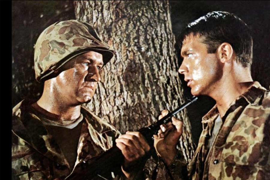 Gene Hackman and Chad Everett in First to Fight (1967).
