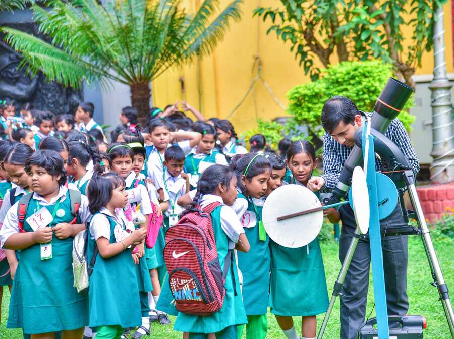 A day ahead of Science Day, school students engage in observation of sun spots at Birla Industrial and Technological Museum on Thursday