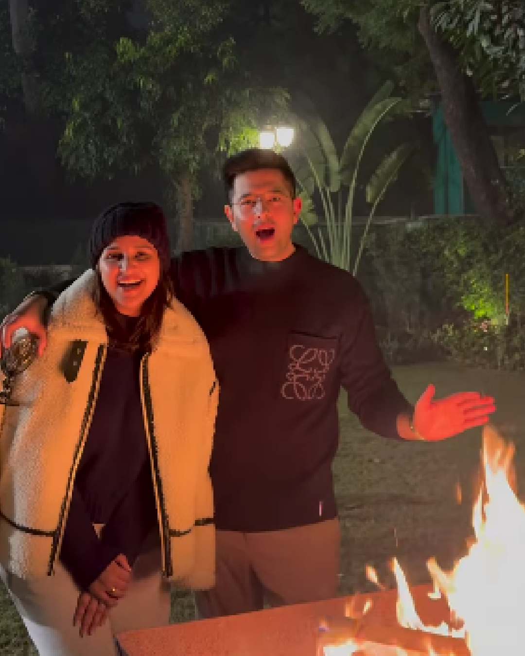 Actress Parineeti Chopra raised a toast to the New Year and new beginnings with husband Raghav Chadha in Delhi. The photo shows them standing before a bonfire in chic winter outfits. 
