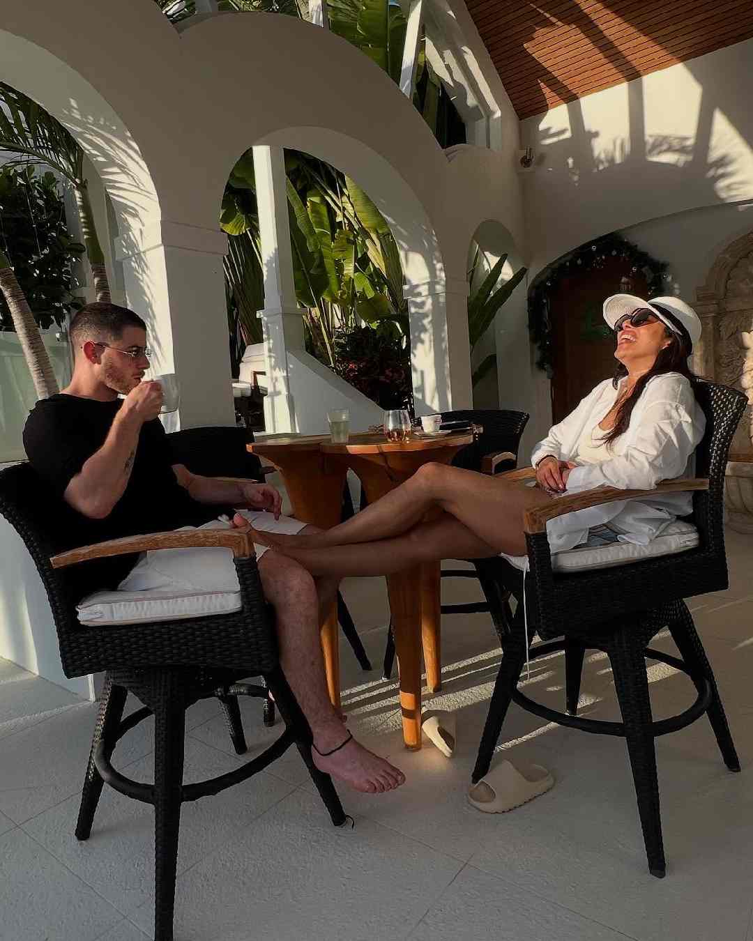 Nick and Priyanka share a cosy moment over a sip. The Baywatch actress’s all-white ensemble is a striking contrast to Nick’s black T-shirt. 