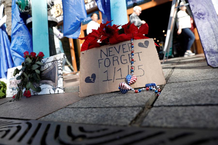 'Never forget 1/1/25', reads one of the signs at the memorial. 